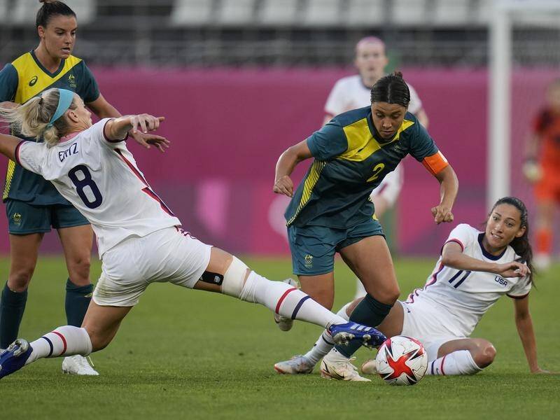 The Matildas sealed an Olympics quarter-final clash with Great Britain after a 0-0 draw with USA.