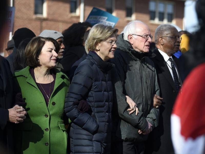 Democratic presidential rivals Amy Klobuchar, Elizabeth Warren and Bernie Sanders.