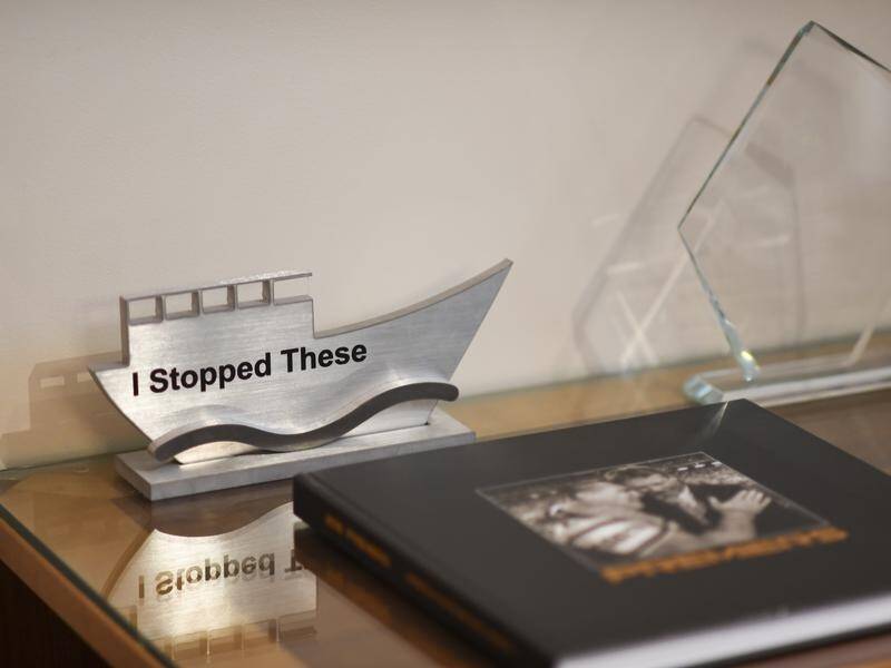 Prime Minister Scott Morrison's boats trophy in his office in Parliament House in Canberra.