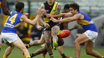 Dustin Martin suffered a hamstring injury in Richmond's 35-point AFL win over West Coast.