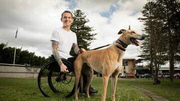 SET TO RACE: Rheed McCracken with his Newcastle companion, Greyhounds As Pets (GAP) adoptee Zyla. Picture: Chris Pavlich. 