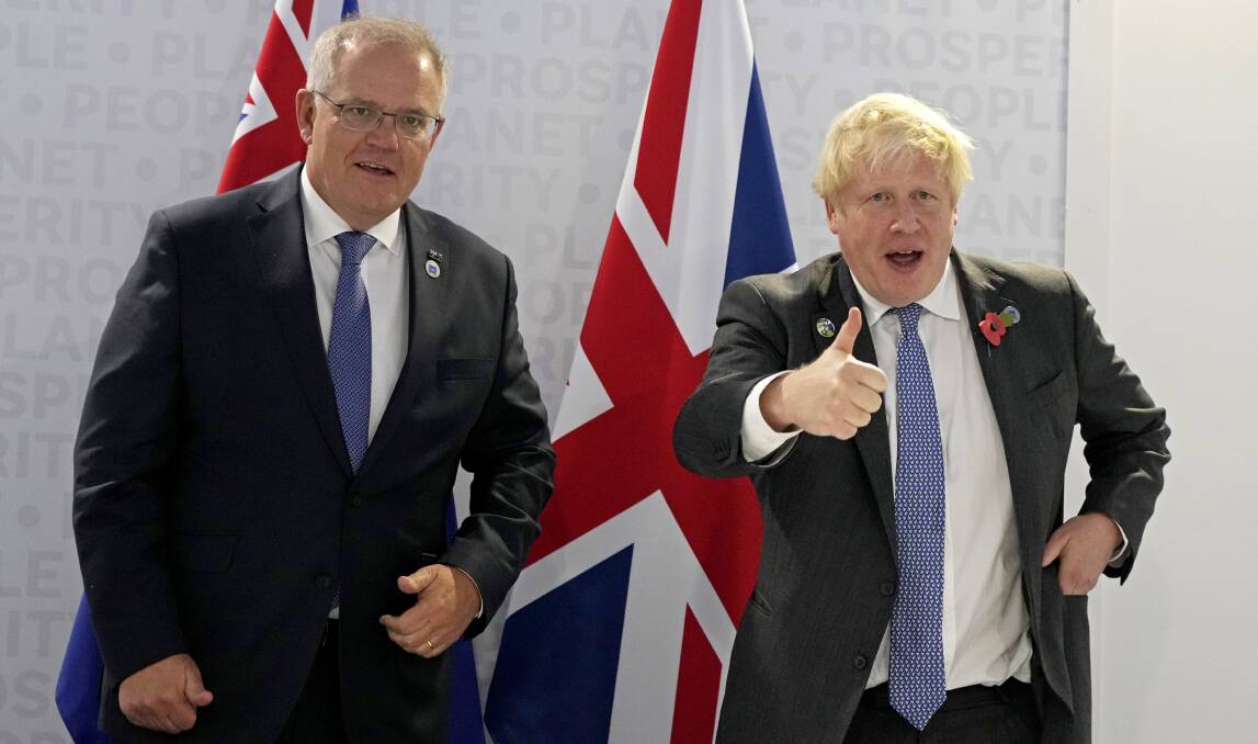 British Prime Minister Boris Johnson and Australia's Prime Minister Scott Morrison at the G20 talks in Rome. Picture: Getty Images 