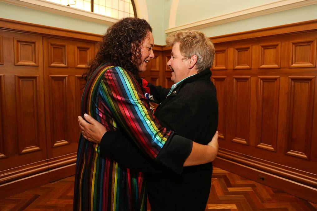 Entertainer Lynda Topp celebrates with Labour MP Louisa Wall after the third reading and vote on the Marriage Equality Bill. Photo: Getty Images